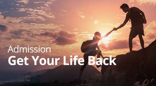 Two people hiking a mountain with the title "Admission, get your life back"