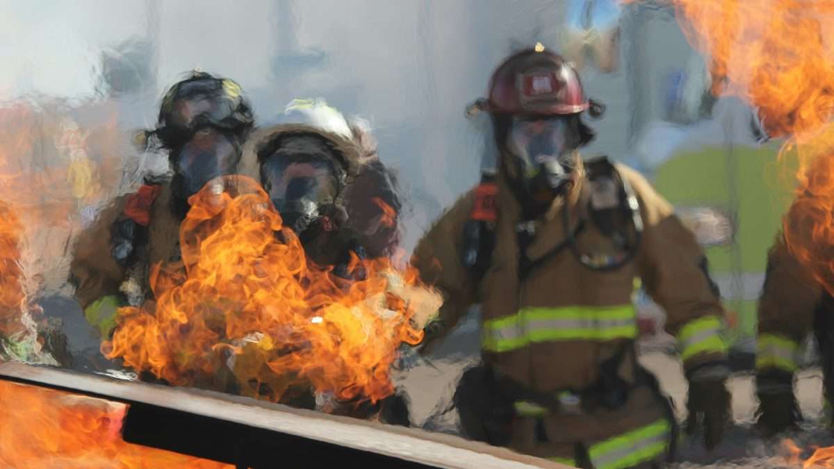 firefighter surrounded by fire