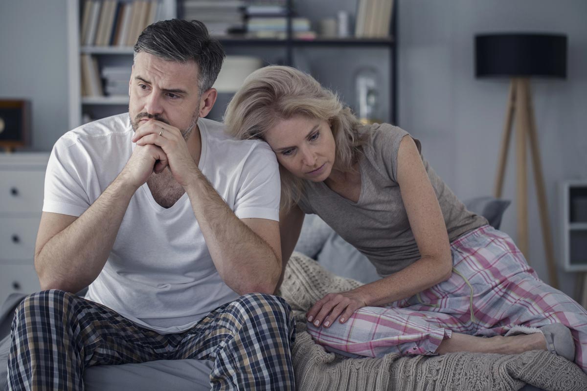 Struggling couple in a sofa