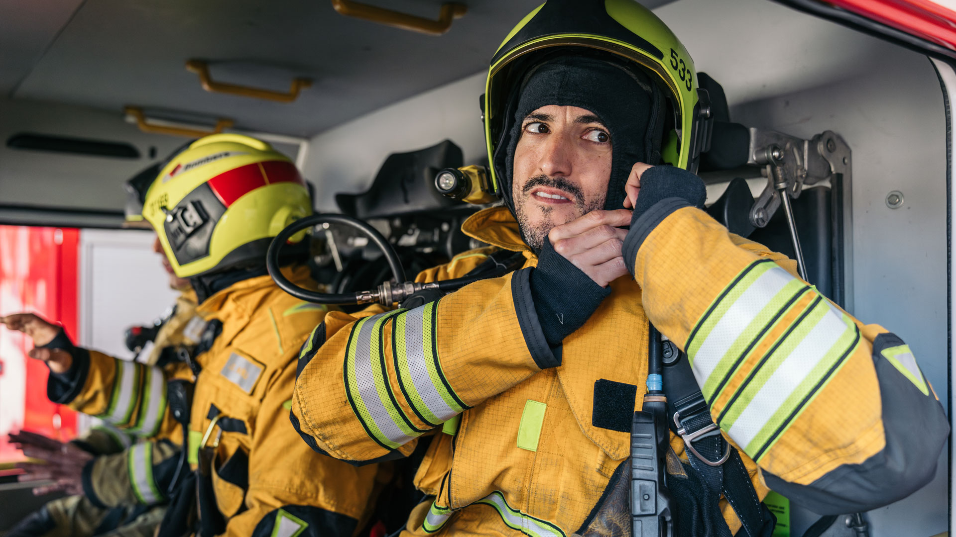 Firefighter preparing for emergency